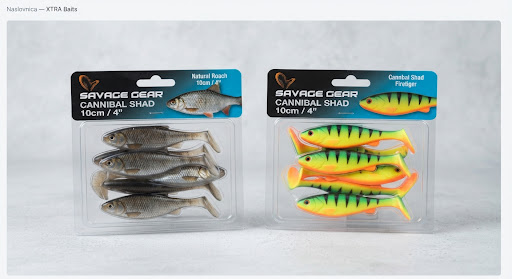 Pack of Savage Gear Cannibal Shad 10cm soft paddle tail lures in natural roach and firetiger predator colors.